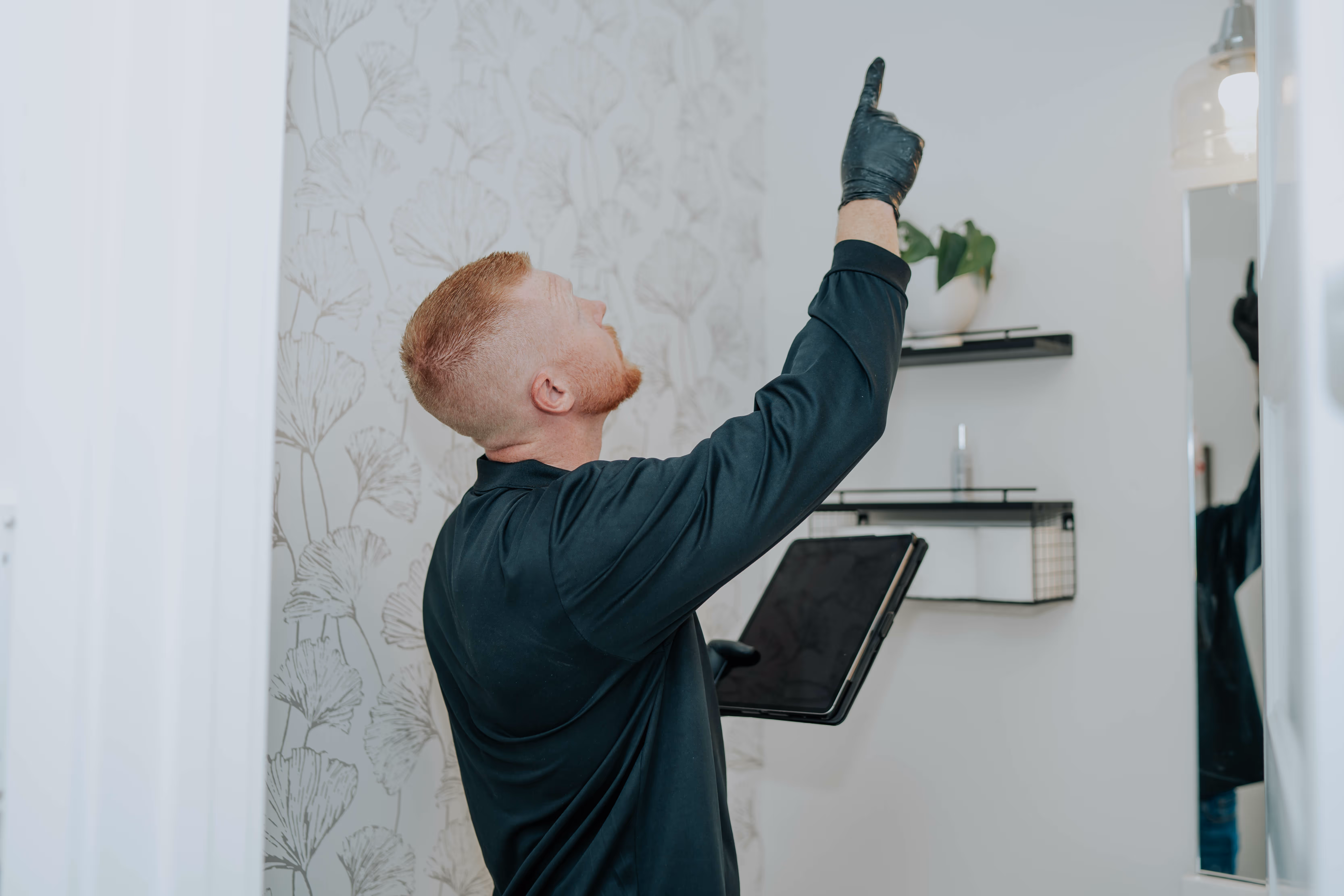 Pure Maintenance of Ohio specialist inspecting a property